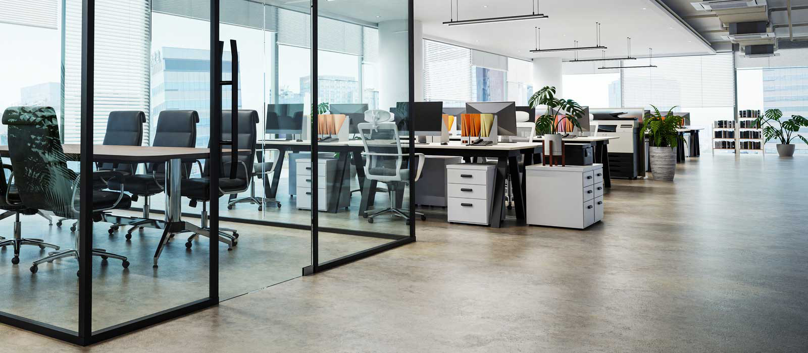 Professional janitorial cleaners servicing a clean modern office environment for Seattle commercial cleaning and janitorial pricing.