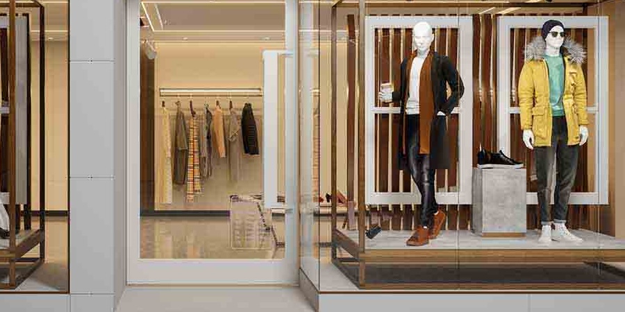A modern clothing storefront with clean glass windows, organized displays, and a polished retail interior, professionally maintained before opening hours in Seattle