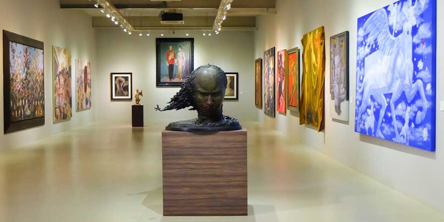 Bright art gallery interior in Seattle with polished floors and exhibition-ready presentation