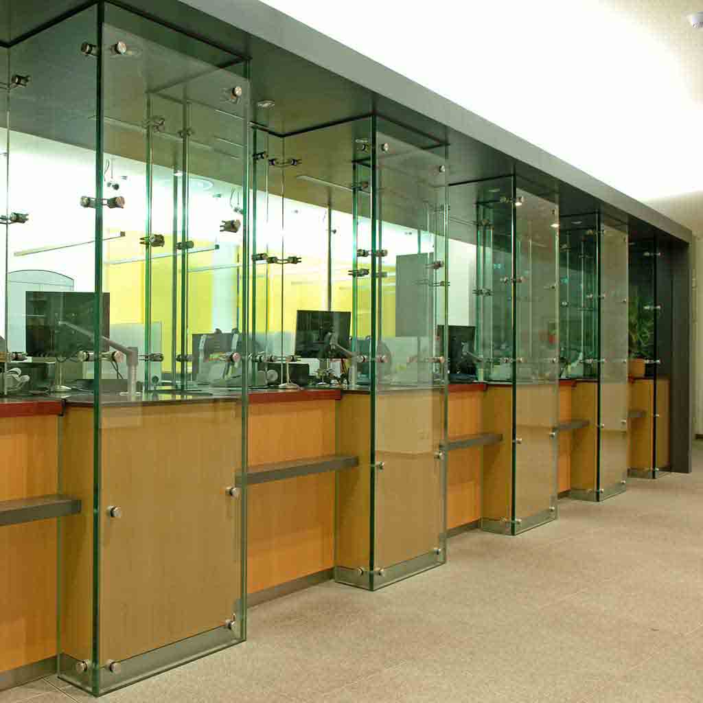 Clean bank branch in Seattle with glass-partitioned teller areas and organized customer space
