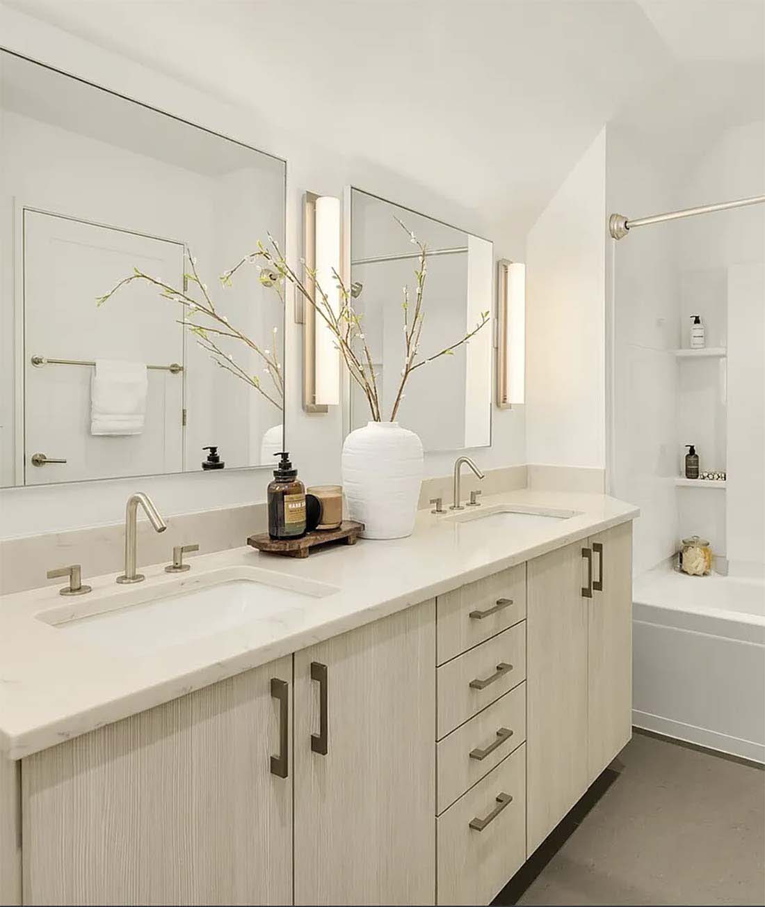 Clean master bathroom with double vanity and quartz countertops in an Issaquah home — Simply Clean regular house cleaning service